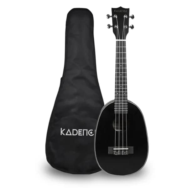 A black Kadence pineapple-shaped soprano ukulele beside its padded gig bag