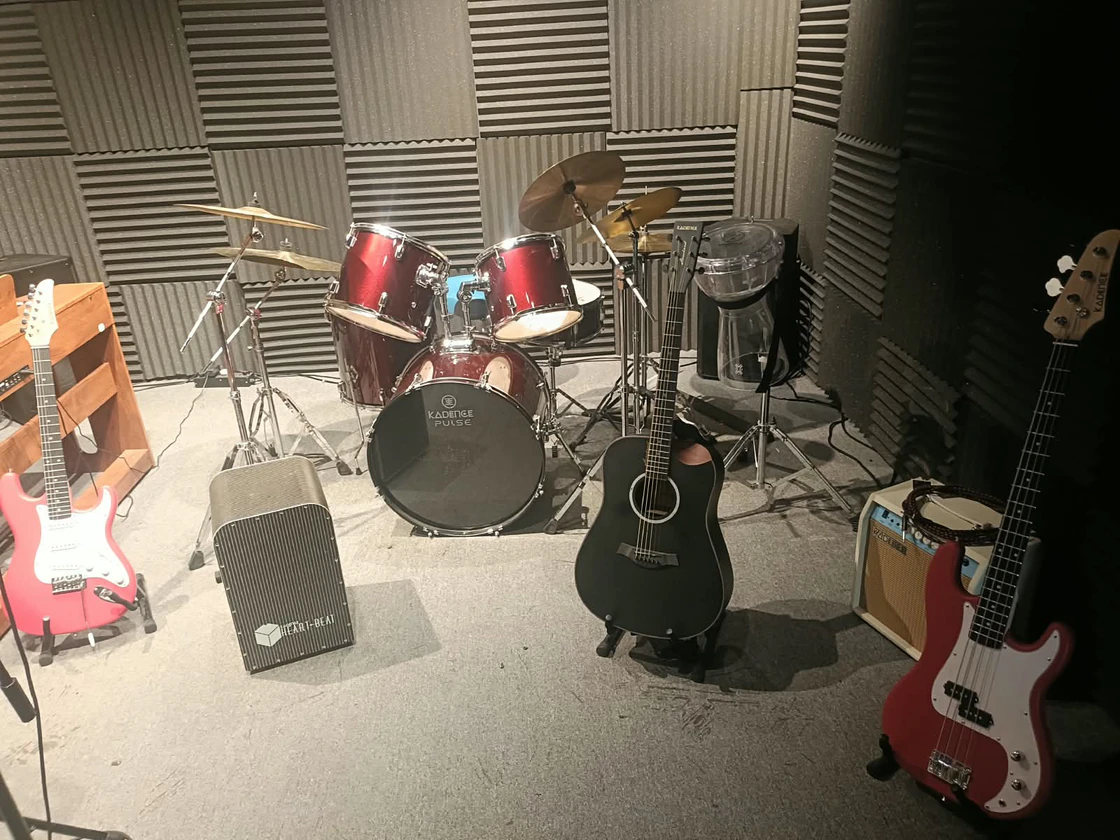 Drum kit, cajon, guitars and bass