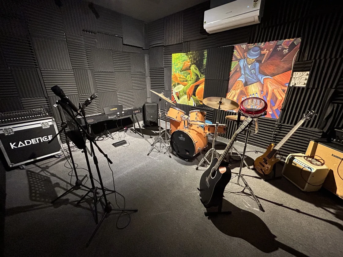 Drum kit, mics and guitars