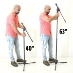 A man showing hight variation of mic stand