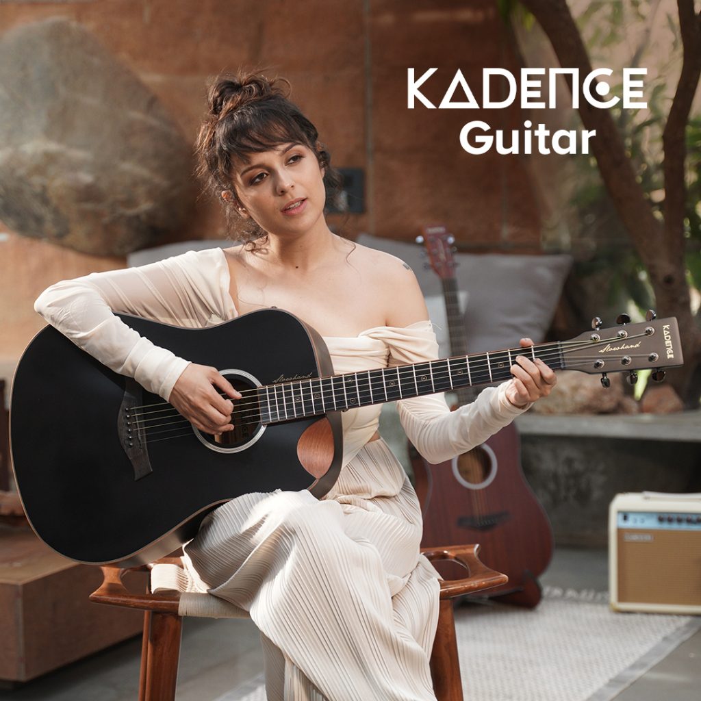 A Girl with Kadence Black Slowhad Series guitar