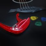 Kadence Guitar Strings and Transparent Red guitar capo with 10 Hostile Guitar picks (Transparent Red) - Image 5